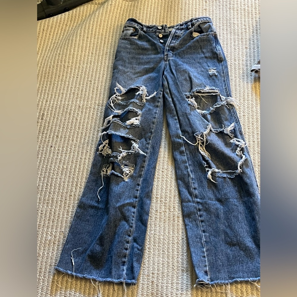 blue ripped jeans